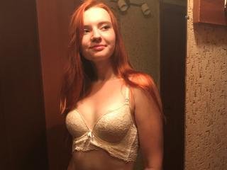 MissFoxxy - Hello guys. I am red head girl and i like to have fun here. In my room we can do many good things and sweet also. I am waiting for you